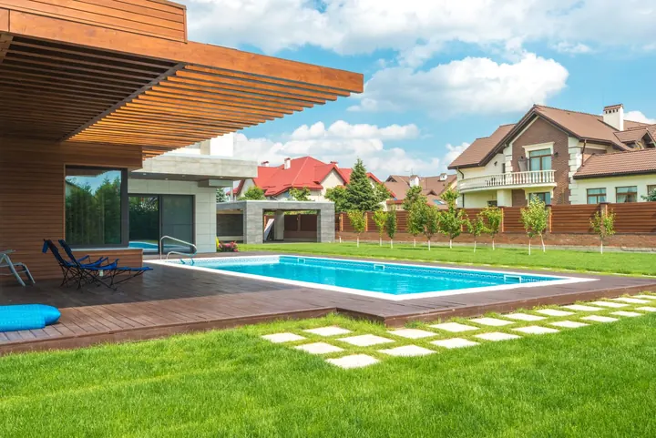 Modern home with a backyard swimming pool