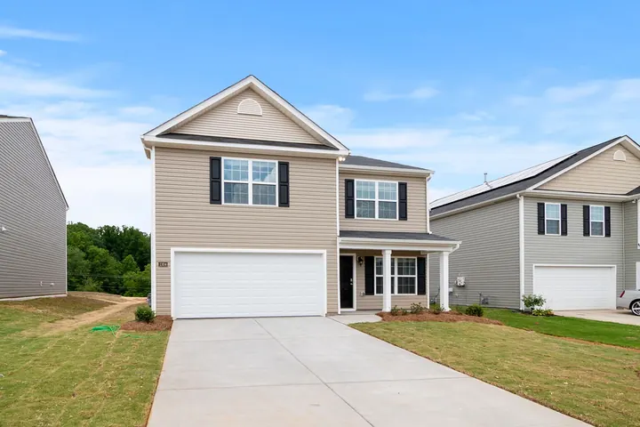 Two story suburban home with a driveway