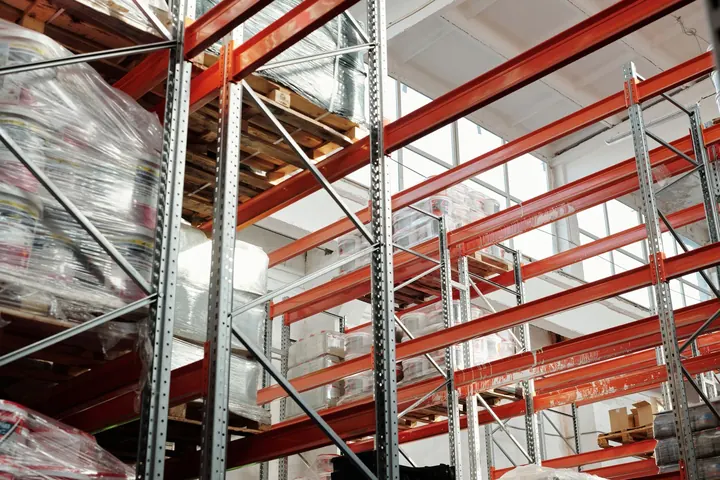Warehouse interior with racks and pallets