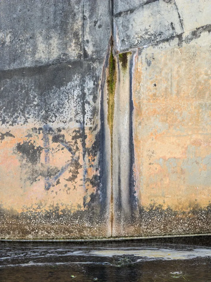 Water stains running down a wall